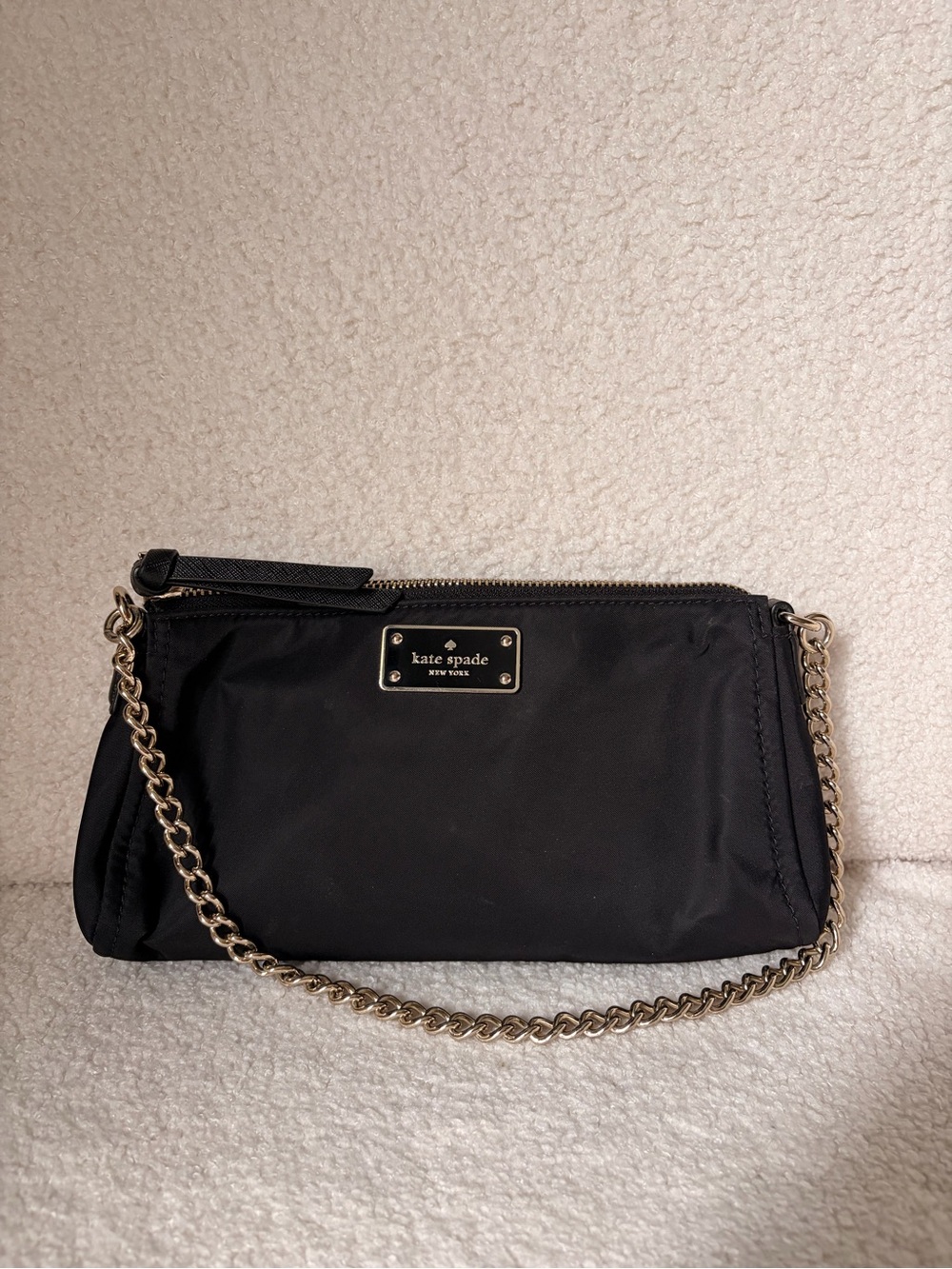 kate spade black nylon wristlet with gold chain strap
